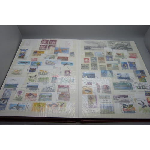 830 - Stamps; a stockbook of Iceland stamps mainly from 1990s and 2000s but some earlier, (the mint stamps... 