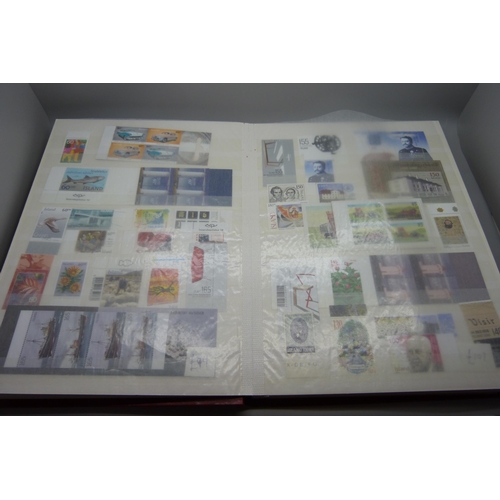 830 - Stamps; a stockbook of Iceland stamps mainly from 1990s and 2000s but some earlier, (the mint stamps... 