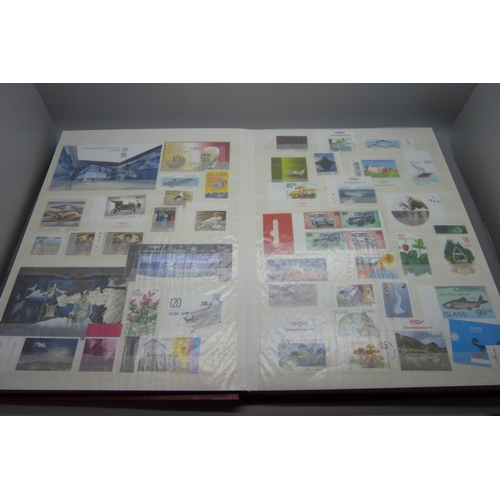 830 - Stamps; a stockbook of Iceland stamps mainly from 1990s and 2000s but some earlier, (the mint stamps... 