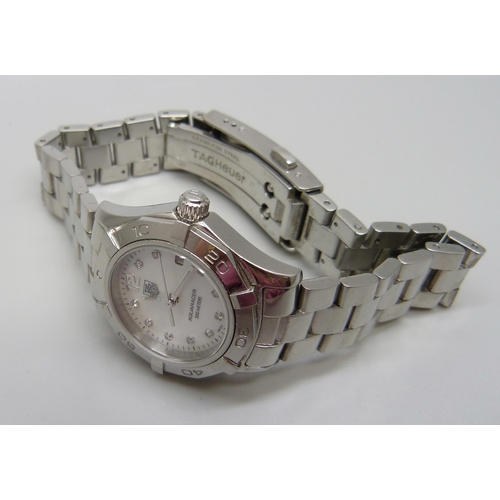 832 - A lady's Tag Heuer Aquaracer quartz wristwatch, stainless steel with mother of pearl dial and diamon... 