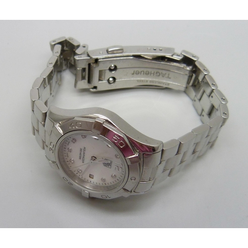 832 - A lady's Tag Heuer Aquaracer quartz wristwatch, stainless steel with mother of pearl dial and diamon... 