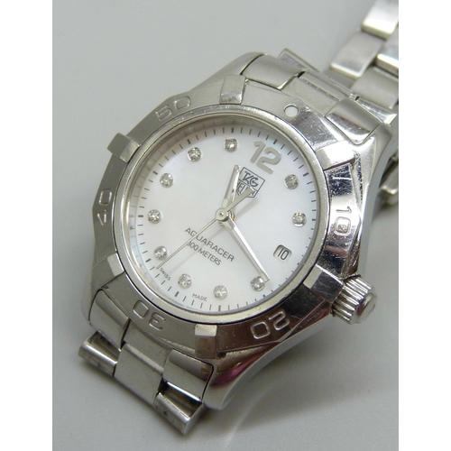 832 - A lady's Tag Heuer Aquaracer quartz wristwatch, stainless steel with mother of pearl dial and diamon... 