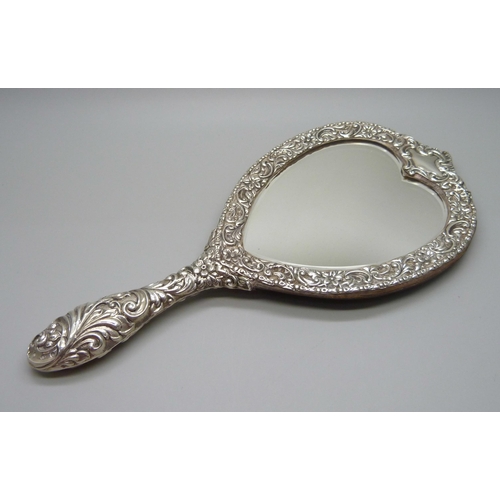 835 - A silver mounted hand mirror, Birmingham 1901