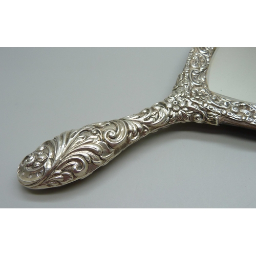 835 - A silver mounted hand mirror, Birmingham 1901