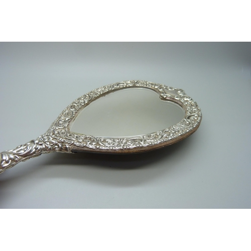 835 - A silver mounted hand mirror, Birmingham 1901