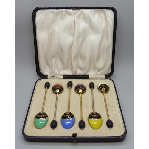 839 - A set of six gilt metal and enamelled coffee bean spoons, in a box