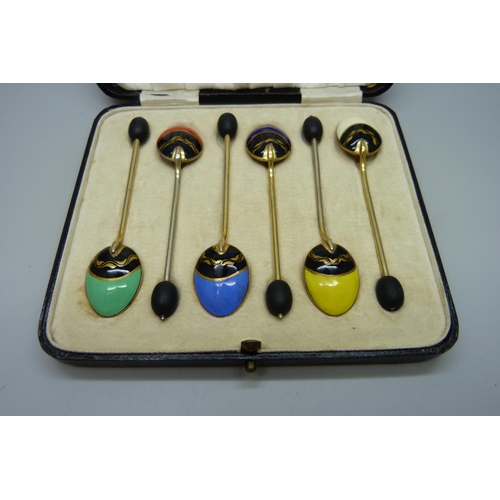 839 - A set of six gilt metal and enamelled coffee bean spoons, in a box