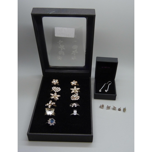 840 - A collection of costume rings and silver earrings