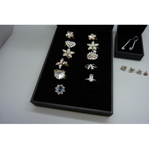 840 - A collection of costume rings and silver earrings