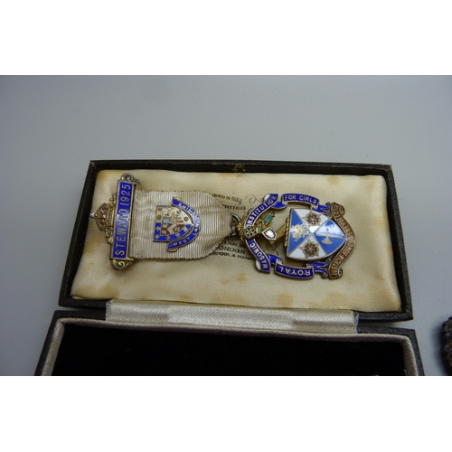 843 - Three silver Masonic jewels and a plated Masonic emblem