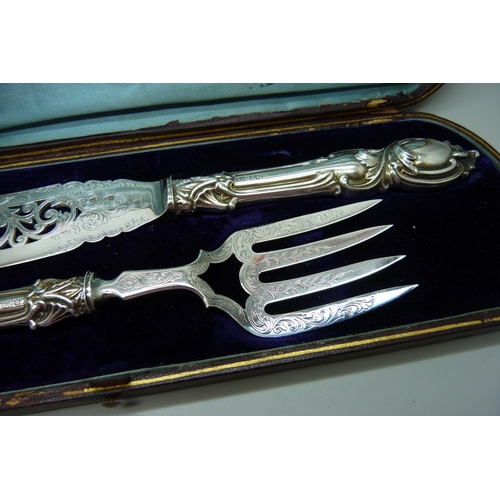 844 - A pair of Victorian fish servers, cased, John Gilbert, Birmingham 1851, silver covered handles, A1 e... 