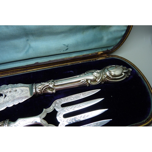 844 - A pair of Victorian fish servers, cased, John Gilbert, Birmingham 1851, silver covered handles, A1 e... 