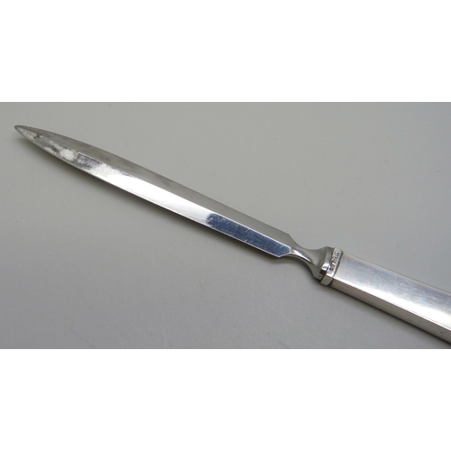 854 - A Georg Jensen, Denmark letter opener, silver covered handle, steel blade, 154mm