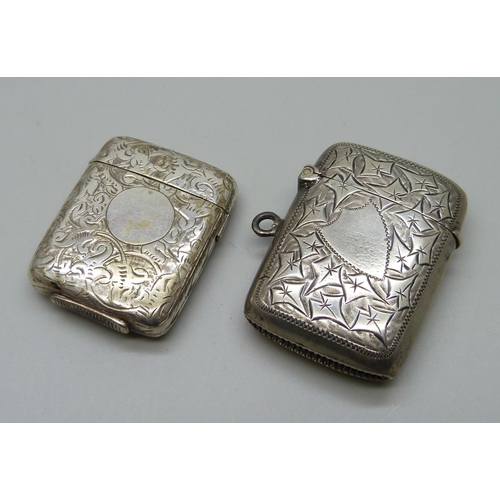 880 - A late Victorian silver vesta case, Birmingham 1898, and a white metal example