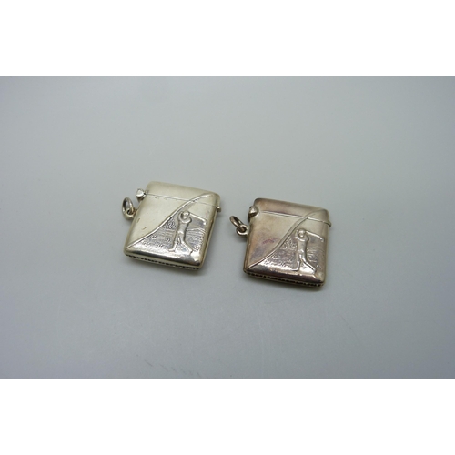 884 - Two golfing interest 925 silver vesta cases