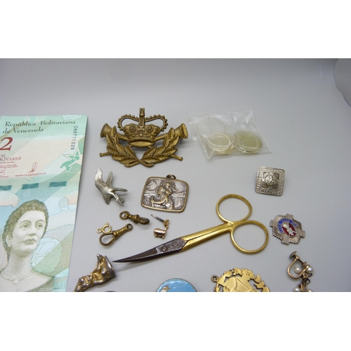 903 - Assorted items including bank notes, military badges, metal Albert chain, etc.