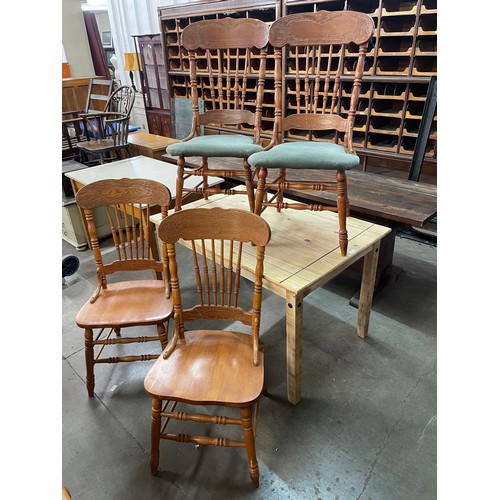 227 - A set of four beech dining chairs and a pine kitchen table