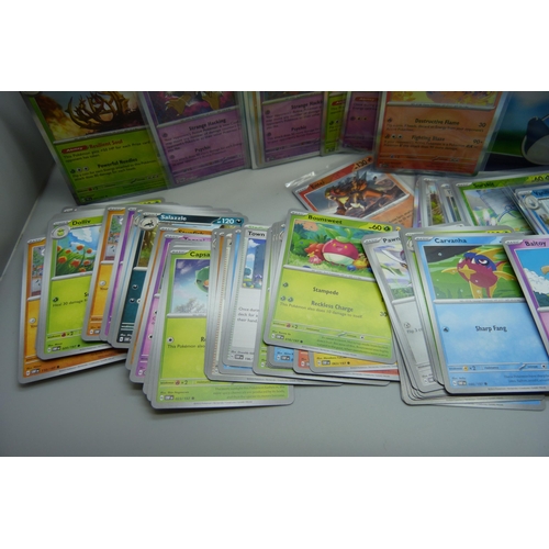 923 - 600 plus Pokémon cards including colour graphic and Black Star rares