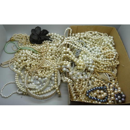 929 - A collection of faux pearl necklets and bracelets