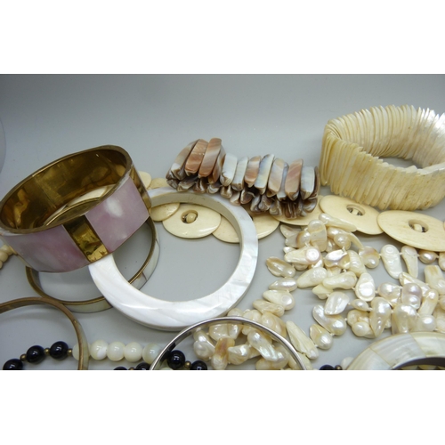 931 - A collection of mother of pearl and bone jewellery