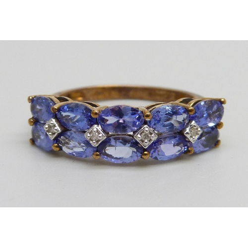 936 - A 9ct gold, tanzanite and diamond ring, 2.5g, O