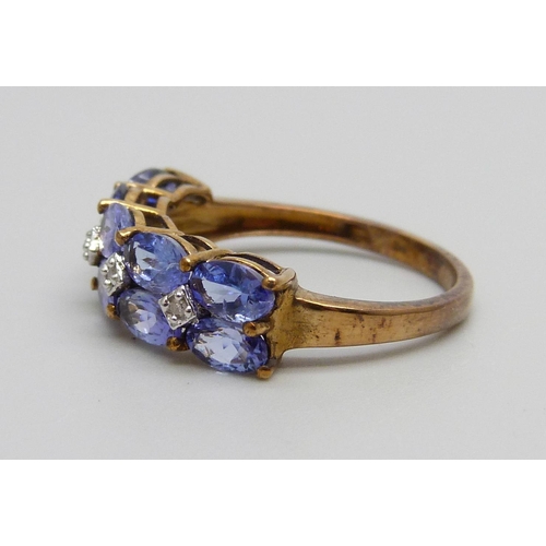 936 - A 9ct gold, tanzanite and diamond ring, 2.5g, O