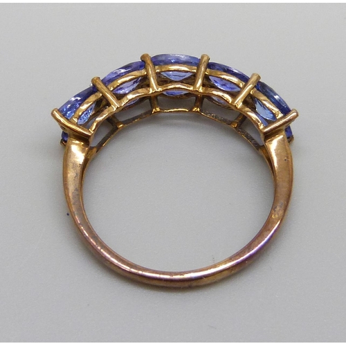 936 - A 9ct gold, tanzanite and diamond ring, 2.5g, O