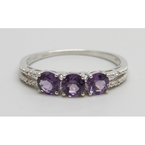 937 - A 9ct white gold, amethyst and diamond ring, 2g,  S