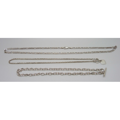 939 - Three silver chains including a Figaro link necklace, 59g