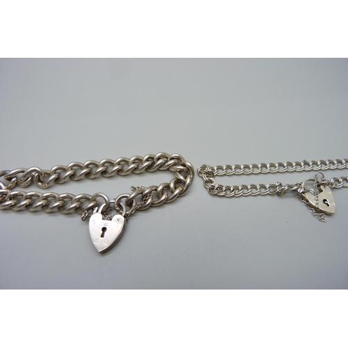 944 - Two silver bracelets with padlock fasteners, 38g