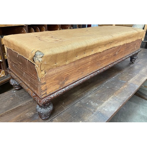 229 - An early Victorian carved mahogany window seat