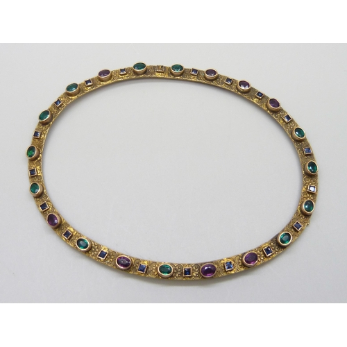 952 - An oval, gilt metal paste stone set frame, 84 x 107mm, lacking one small square stone