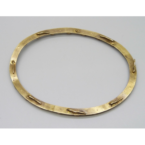 952 - An oval, gilt metal paste stone set frame, 84 x 107mm, lacking one small square stone