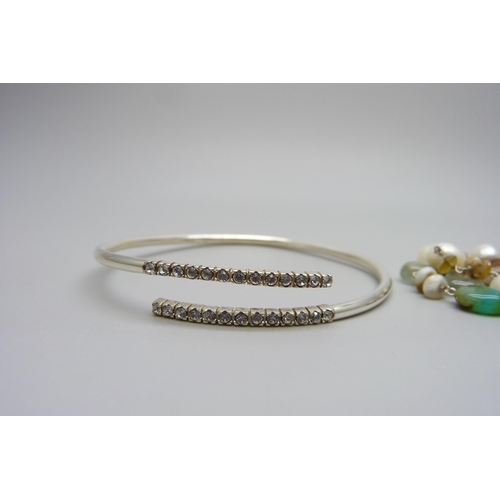 953 - A silver stone mounted triple row bracelet and a silver bangle