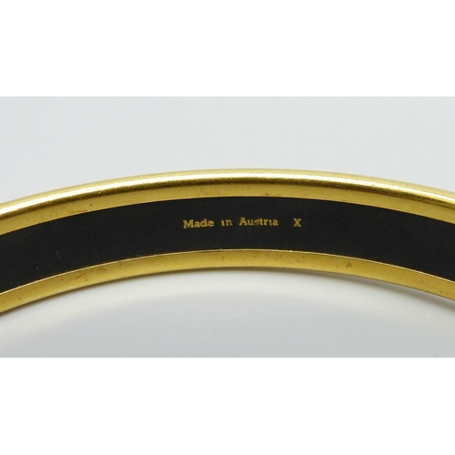 956 - A Hermès Paris enamelled bangle, made in Austria, 67mm inner diameter