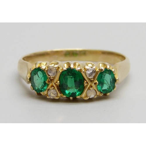 963 - A 15ct gold, green stone and diamond ring, 4.1g, S, (two outer green stones a/f)