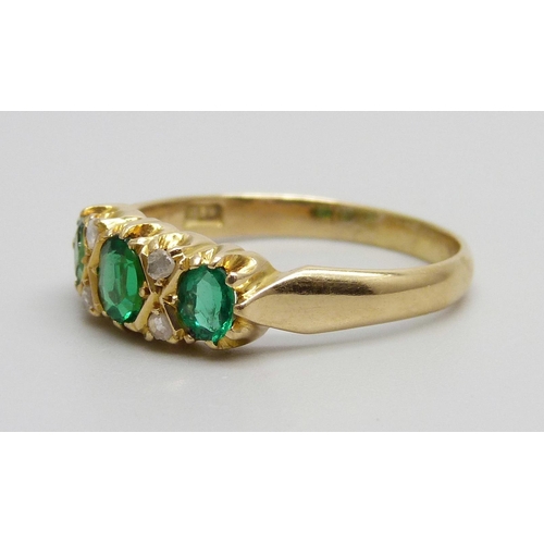 963 - A 15ct gold, green stone and diamond ring, 4.1g, S, (two outer green stones a/f)