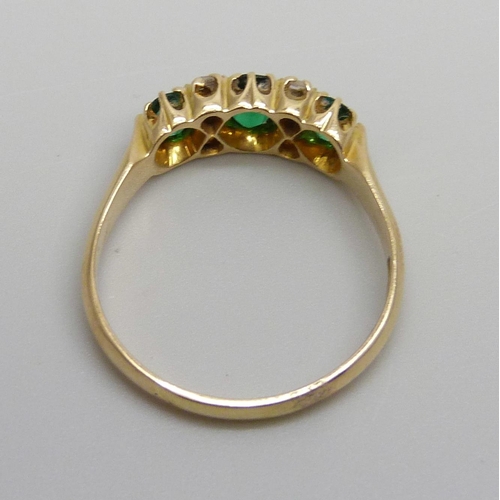 963 - A 15ct gold, green stone and diamond ring, 4.1g, S, (two outer green stones a/f)