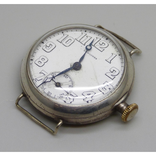 976 - A Longines silver cased wristwatch with engraved case back, the case marked A.W.C. Co., 32mm case