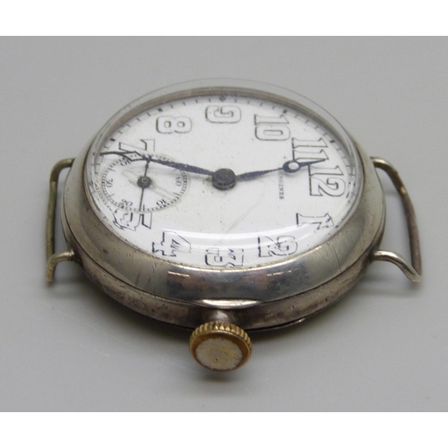 976 - A Longines silver cased wristwatch with engraved case back, the case marked A.W.C. Co., 32mm case