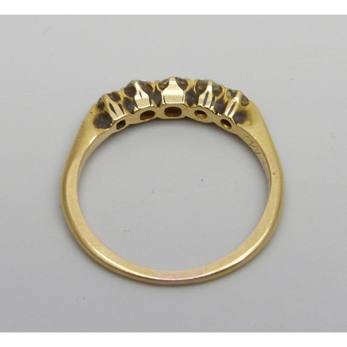 980 - A yellow metal ring set with five diamonds, 2.6g, N