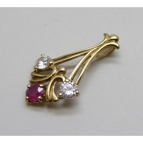 982 - A 9ct gold, ruby and white stone pendant, 1g, 21mm