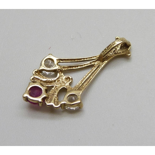 982 - A 9ct gold, ruby and white stone pendant, 1g, 21mm