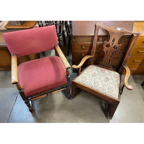 215 - A George III oak rocking chair and a carved oak armchair