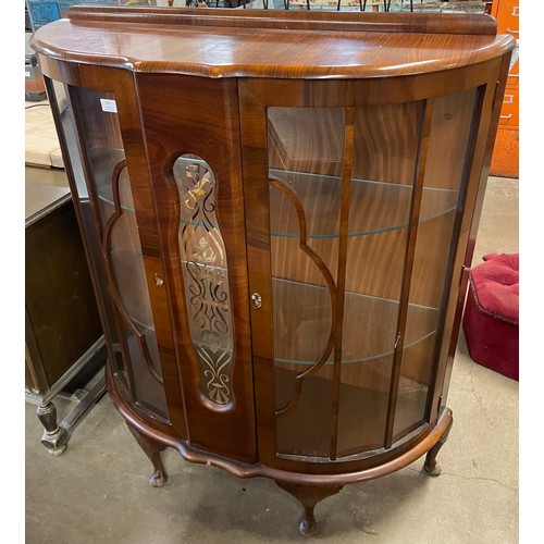 219 - An early 20th Century walnut display cabinet