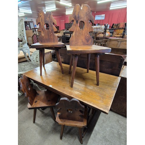 239 - A Dutch style pine refectory table and four chairs