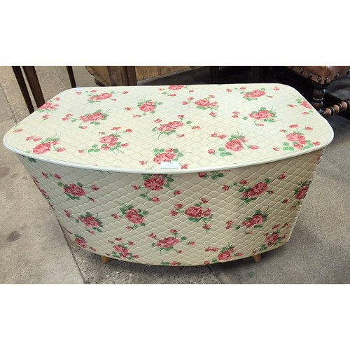 251 - A Modern Industries floral patterned vinyl ottoman