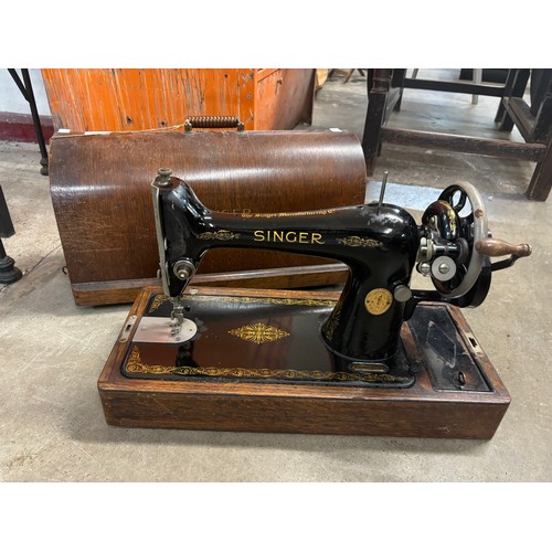 252 - A cased Singer sewing machine