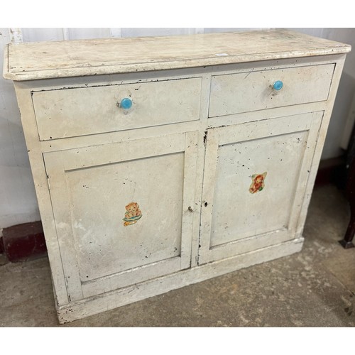 254 - A Victorian painted two door cupboard