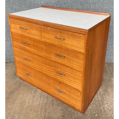 24A - A Remploy teak and Formica topped chest of drawers